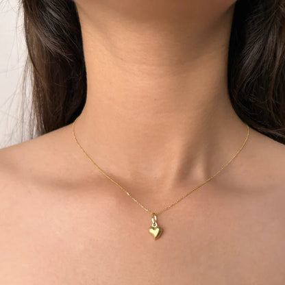 Delicate Minimal Heart Necklace styled with a simple heart pendant for everyday wear