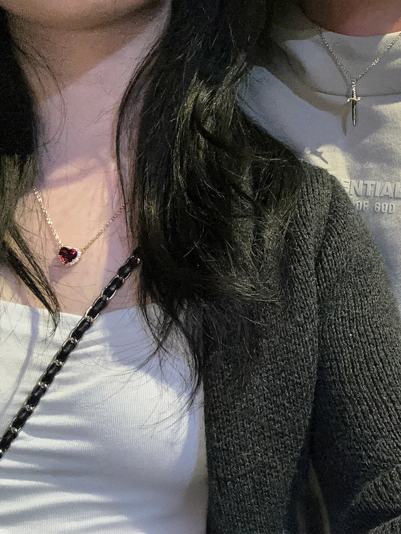Red heart necklace with silver chain in jewelry box