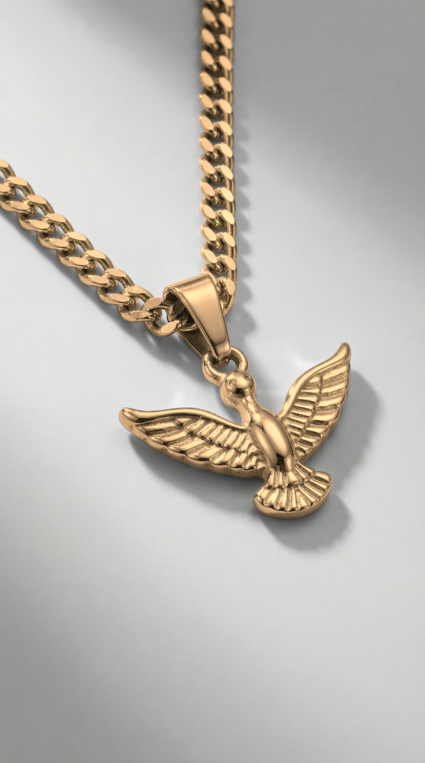 Gold Liberty pendant necklace for men featuring a winged design in premium 316L stainless steel with a Cuban chain.